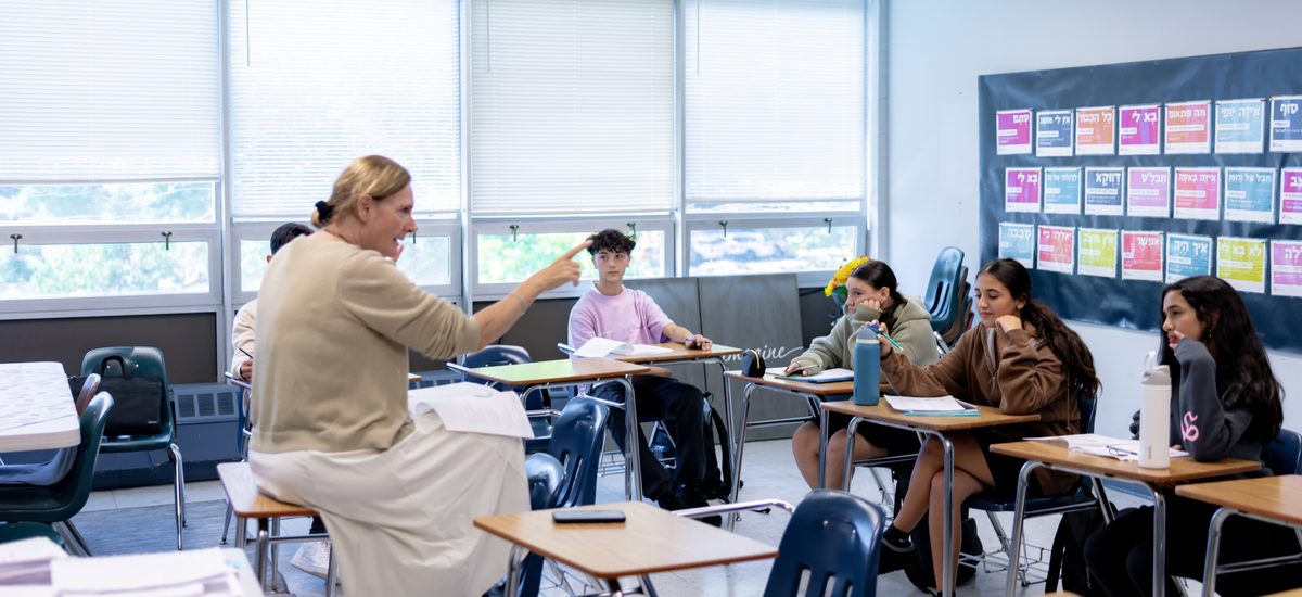 A WHHS class in discussion with their teacher