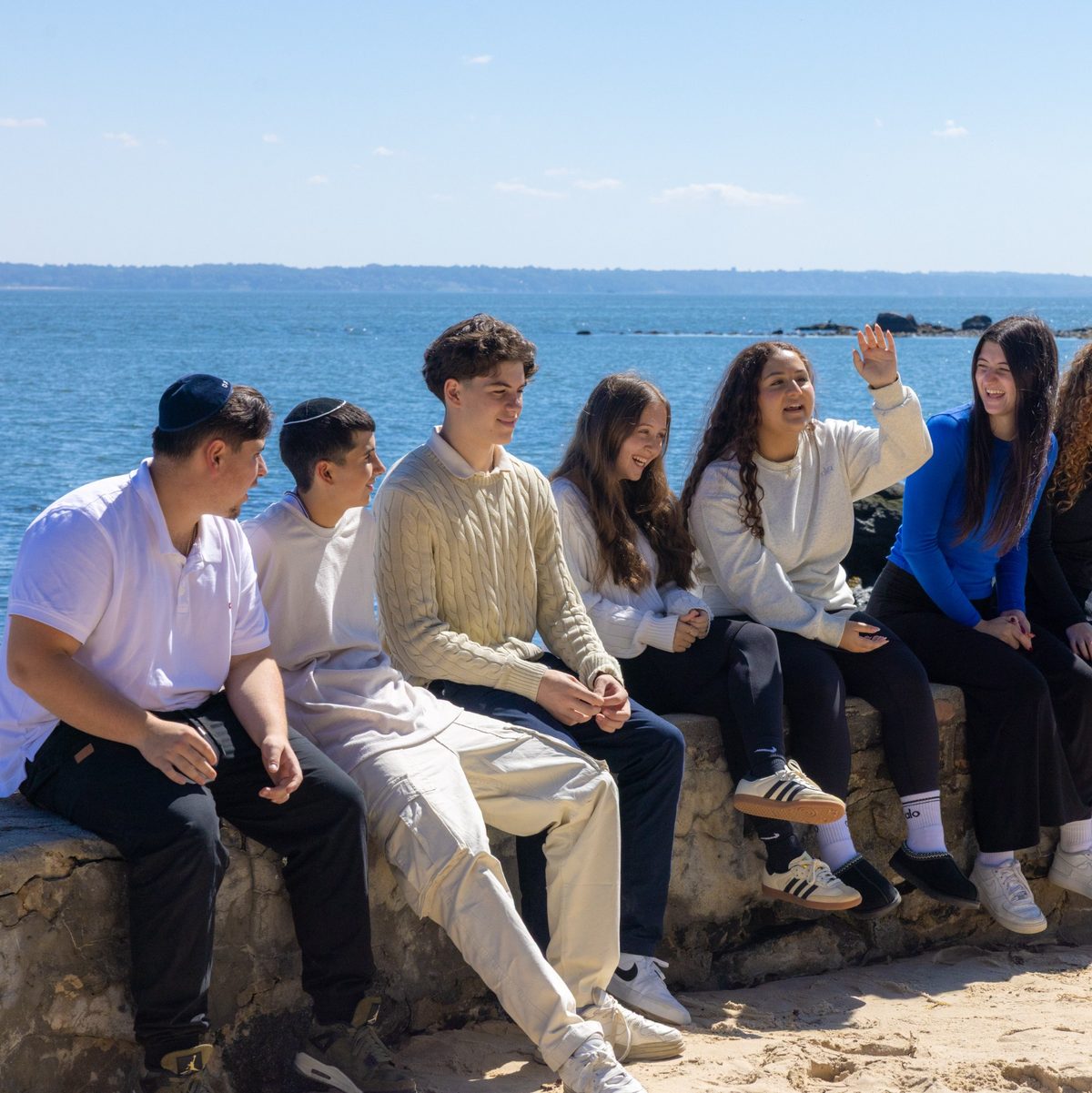 WHHS students on the rocks by the Long Island Sound