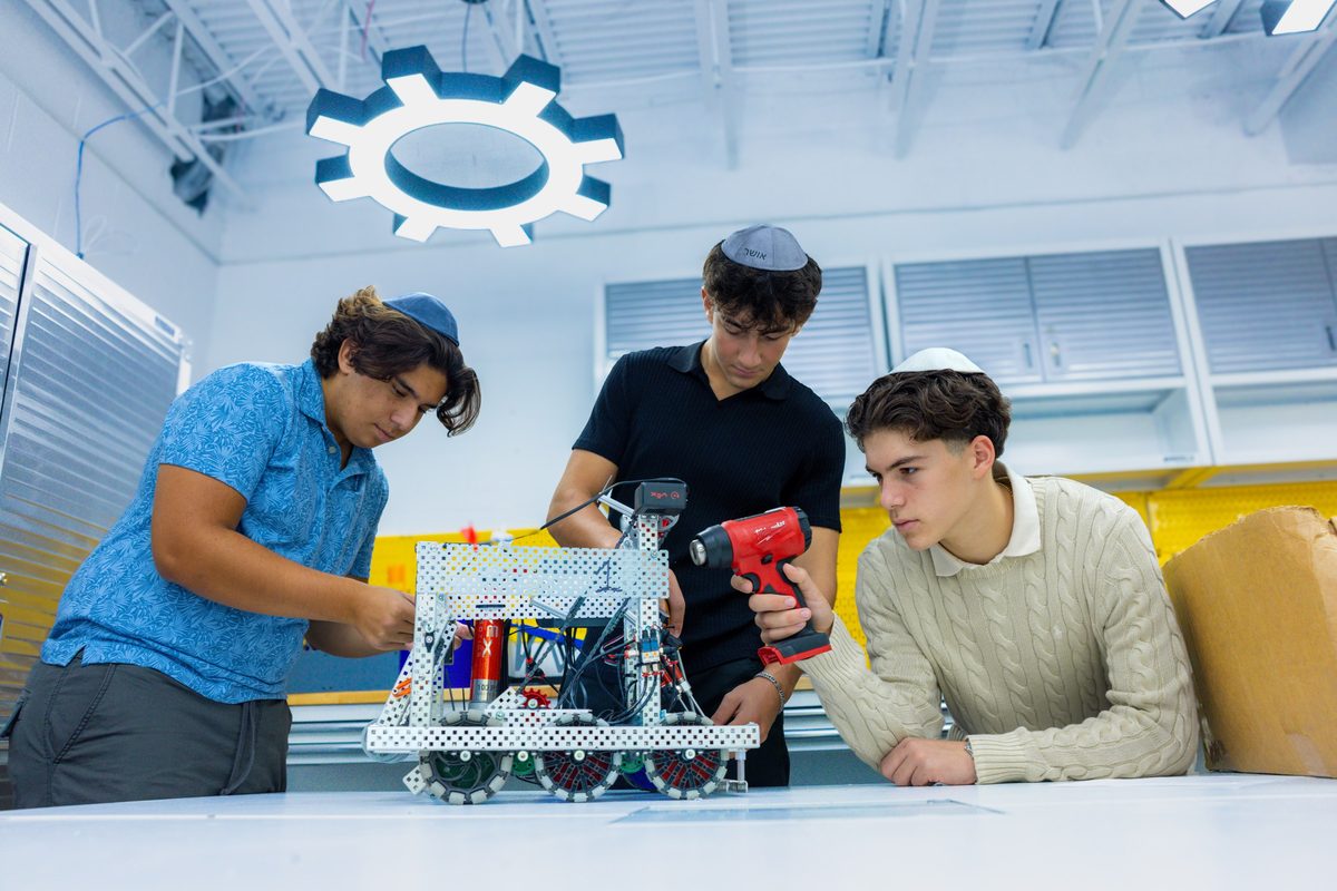 WHHS students building a VEX robot in the STEAM lab